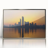 Mid-century modernist art of Abu Dhabi skyline in silver framed acrylic, featuring cool blue and gray tones.