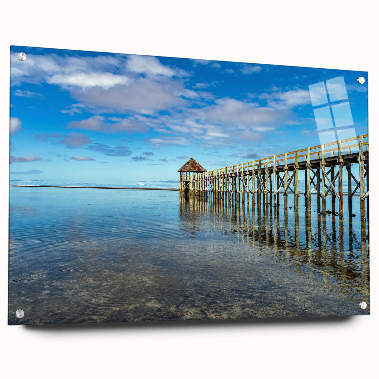 Large abstract wall art of an oceanic scene in blue tones on acrylic glass, ideal for bedroom or dining room decor.