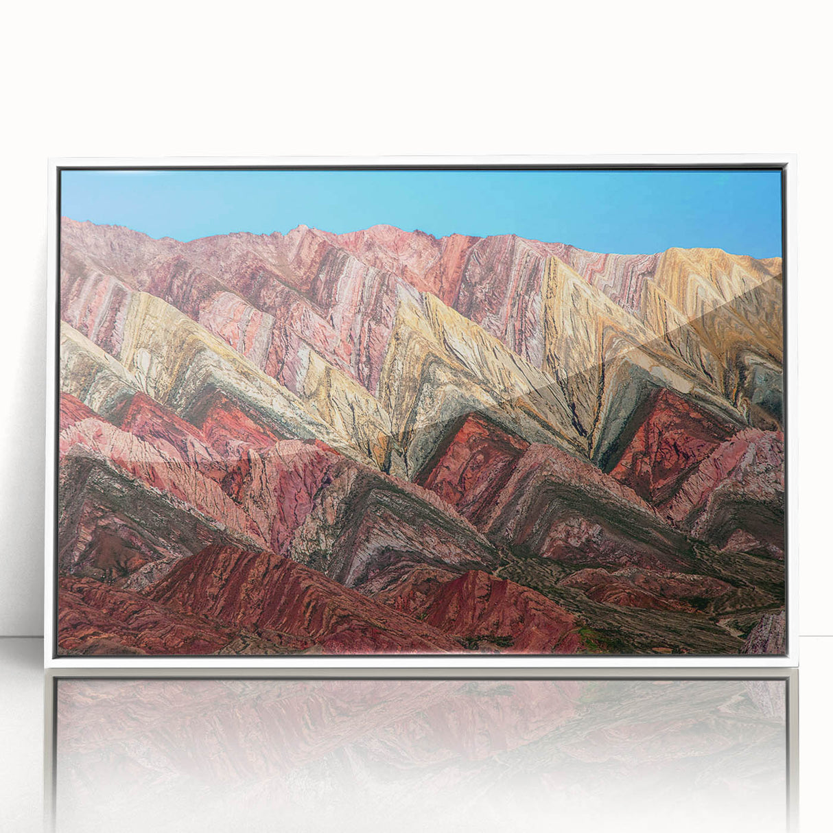 Acrylic print of a serene South American landscape in soft earth tones, framed in white, suitable for modern nursery decor.