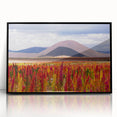 Large abstract wall art depicting a Bolivian landscape in muted earth tones on a black framed acrylic print.