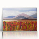 Art deco poster of a Bolivian landscape on white framed acrylic, featuring muted earth tones.