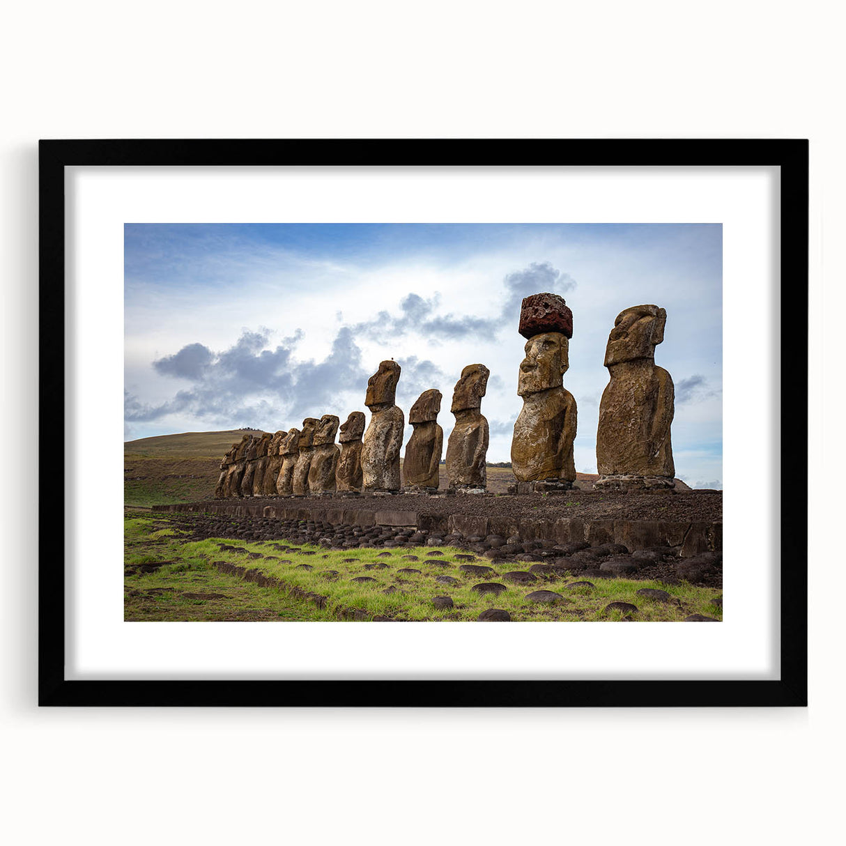 Abstract art print of a vibrant, textured Chilean landscape in a black frame with mat, ideal for living room decor.