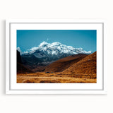 Abstract art print of an Ecuadorian landscape in muted earth tones on a framed white mat, suitable for dining room decor.