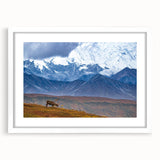 Abstract art print featuring serene Alaskan landscape in muted blue and green tones on a framed white mat.