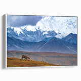 Vintage poster art of an Alaskan landscape on a framed canvas, featuring muted earth tones, ideal for living room decor.