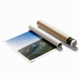 Rolled print of Arkansas scenery with floral motifs in soft pastel colors.