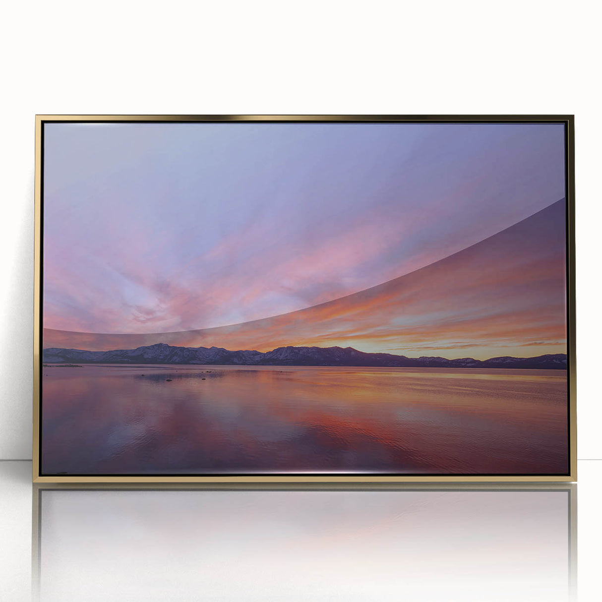 Large art print of Lake Tahoe with muted blue and green tones on a gold-framed acrylic, ideal for modern art wall decor.
