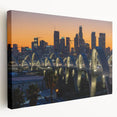 Los Angeles skyline depicted in muted gray and blue tones on a large stretched canvas, ideal for kitchen wall art.
