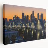 Los Angeles skyline depicted in muted gray and blue tones on a large stretched canvas, ideal for kitchen wall art.