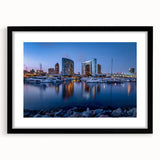 Extra large abstract art print of colorful, textured San Diego scenery on a black-framed canvas, ideal for living room decor.