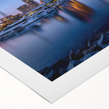 Art deco poster of San Diego skyline in muted blue and orange tones on rolled canvas, ideal for dining room wall art.