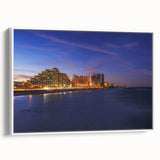 Vintage poster art of Daytona scenery on framed canvas, featuring colorful imagery against a black background.