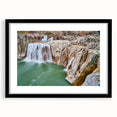 Colorful abstract art print of a textured Idaho landscape in vibrant hues, framed in black, ideal for living room decor.