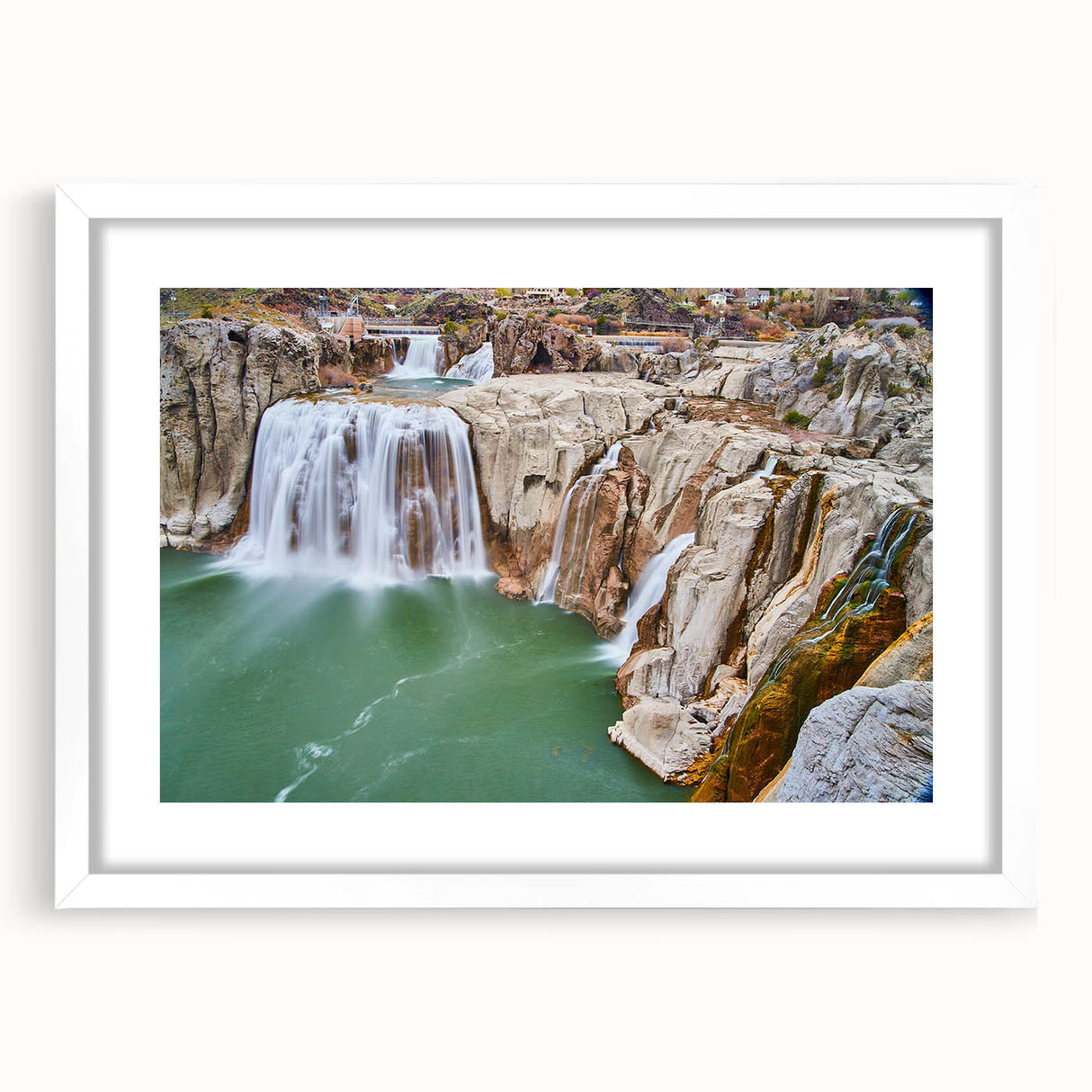 Abstract art print of Idaho scenery in muted earth tones on a white matted frame, suitable for dining room decor.