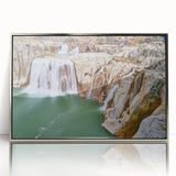 Mid-century modernist art depicting Idaho scenery in muted earth tones on a silver-framed acrylic print.