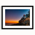 Colorful abstract art print of Acadia, featuring vibrant, textured hues, framed in black, ideal for living room decor.
