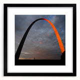 Abstract art print of St. Louis skyline in vibrant, colorful hues on a large, textured canvas, ideal for living room decor.