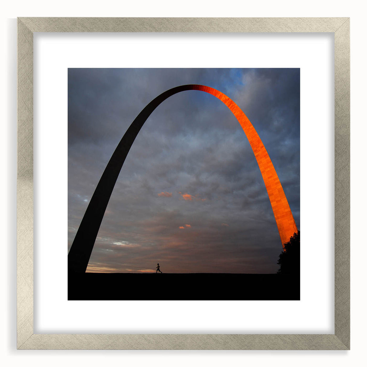 Textured art print of St. Louis skyline in muted gray and blue tones on a framed silver mat, suitable for bedroom decor.
