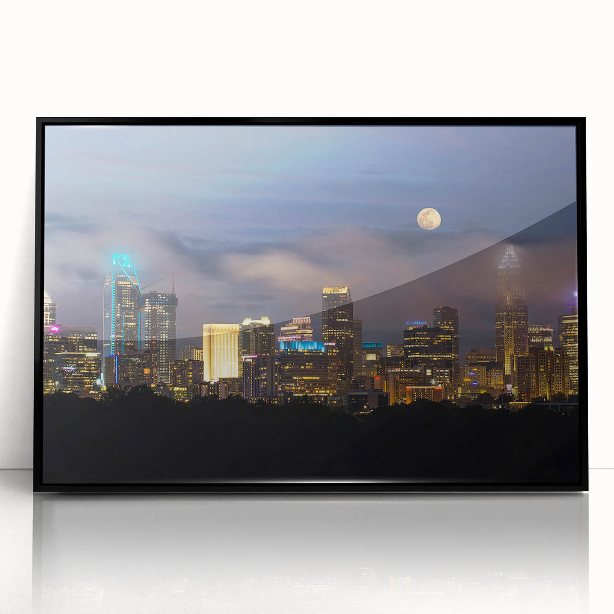 Large abstract wall art depicting the Charlotte skyline in muted blue and gray tones on a framed acrylic print.
