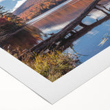 Art deco poster featuring a serene Vermont landscape on a rolled canvas, with muted earth tones.