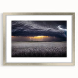 Textured art print of abstract Palouse scenery in muted earth tones, framed in silver, suitable for bedroom wall decor.