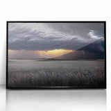 Large abstract wall art of the Palouse landscape in muted green and brown tones, framed in black acrylic.