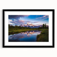 Colorful abstract art print of the Grand Tetons, featuring a textured design in vibrant hues on a large framed canvas.