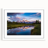 Abstract art print of Wyoming's Grand Tetons in muted earth tones on a white framed canvas.
