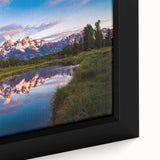 Extra large framed canvas of the Grand Tetons in black with colorful, textured details, suitable for living room decor.