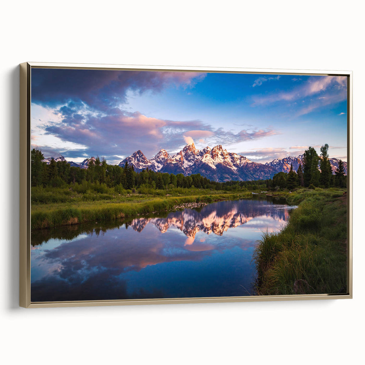 Framed canvas featuring a vintage-style landscape painting of the Grand Tetons, set against a black background.