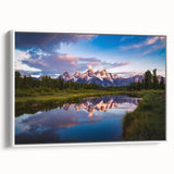 Vintage poster art of USA's Grand Tetons on a framed canvas, featuring a colorful palette with black accents.