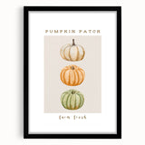 Abstract art print featuring textured, colorful foliage on a large canvas, framed in black, suitable for living room decor.