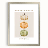 Textured abstract art print depicting autumnal colors in a silver frame, suitable as bedroom art.