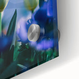 Large abstract wall art on acrylic glass depicting spring themes in vibrant green and yellow, ideal for dining room ambiance.