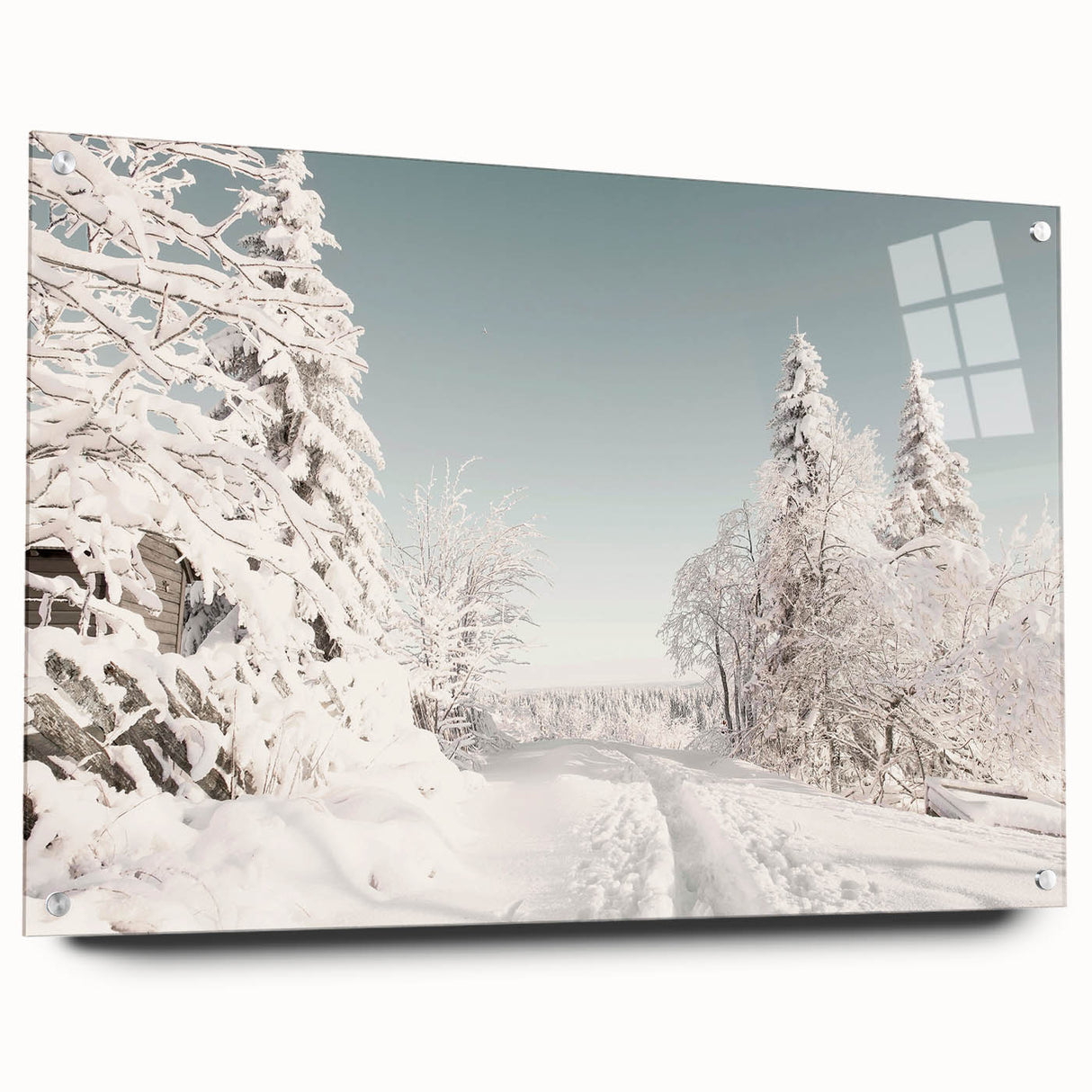 Large abstract wall art depicting winter season in muted blue and white tones on acrylic glass.