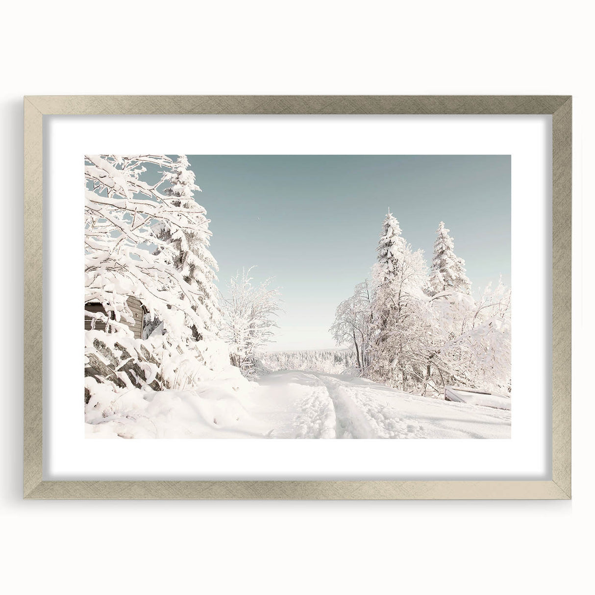 Textured abstract art print in cool gray and blue tones, framed in silver, suitable for bedroom wall decor.