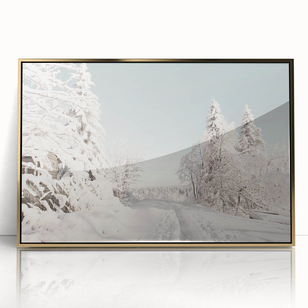 Large art print of a winter scene in mid-century modernist style, with muted blue and white tones on framed acrylic.