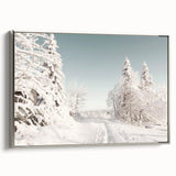 Winter landscape painting on framed canvas, featuring muted blue and white tones, ideal for living room decor.