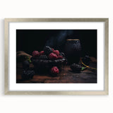 Textured art print featuring an abstract array of fruits in muted earth tones, framed in silver.