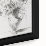 Close-up of a framed canvas displaying vibrant abstract floral designs in shades of pink, blue, and green, perfect for modern home decor.