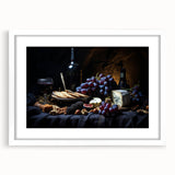 Abstract art print featuring assorted fruits in bright colors on a white framed mat, ideal for dining room decor.