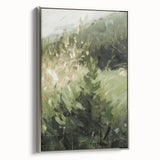 Framed canvas artwork showcasing an abstract floral design with vibrant colors, set in a sleek silver frame, ideal for modern home decor.