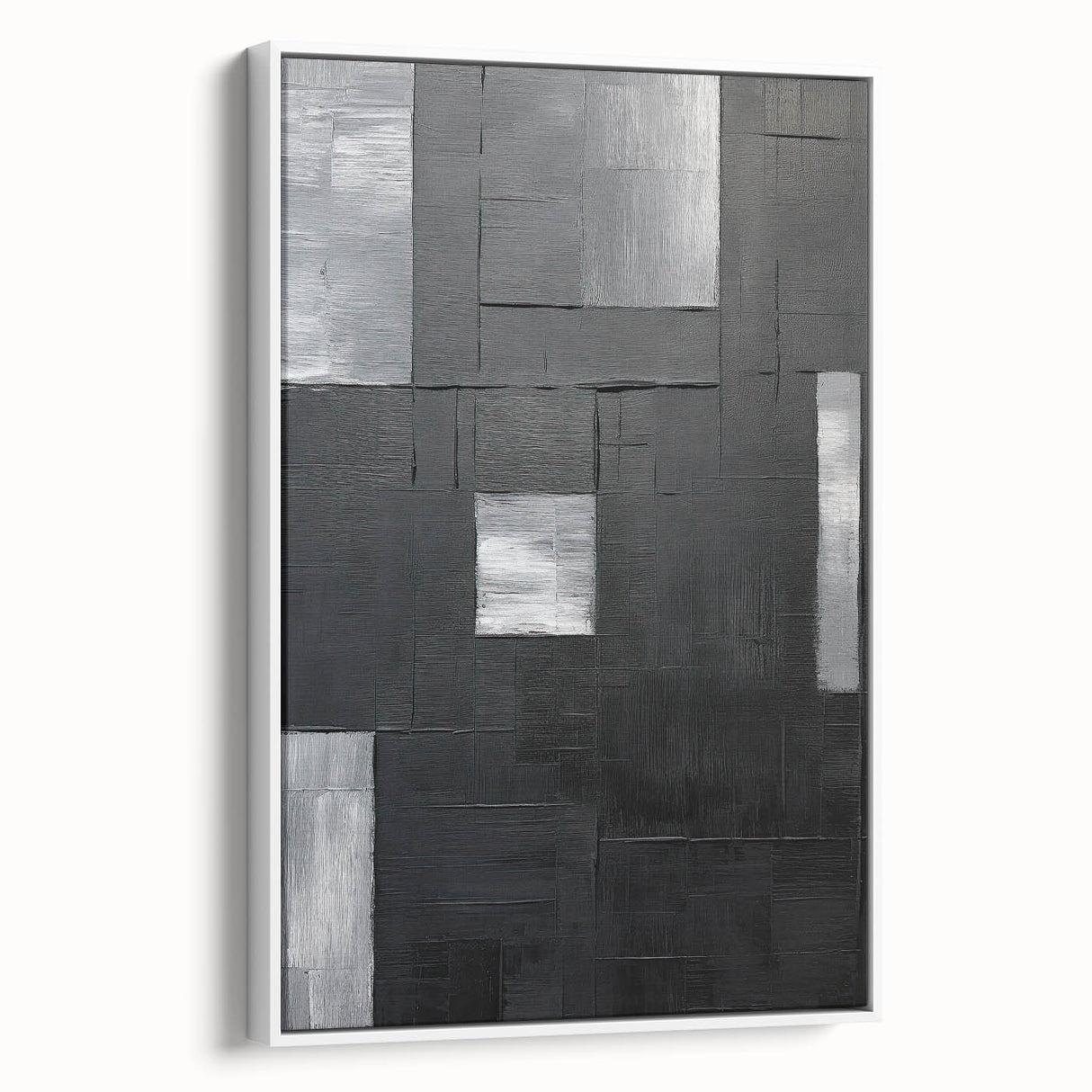 Framed minimalist abstract wall art showcasing a sleek white design with smooth edges, ideal for modern decor, displayed from a side view against a neutral background.