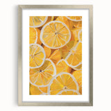 Textured abstract art print featuring assorted fruits in muted colors, framed in silver, ideal for kitchen wall decor.
