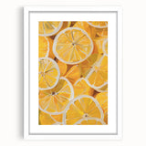 Abstract art print of assorted fruits in vibrant colors on a white framed mat, suitable for dining room decor.