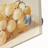 Close-up of large abstract wall art featuring assorted fruits in vibrant colors on acrylic glass.