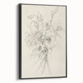 Framed canvas artwork displaying an abstract floral design with vibrant colors, viewed from the side, highlighting its sleek black frame and elegant presentation.
