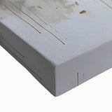 Close-up of a stretched canvas showcasing vibrant abstract floral designs in rich colors, ideal for modern home décor or art enthusiasts seeking a bold statement piece.