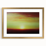 Abstract landscape artwork framed with a gold mat, showcasing soft hues of blue and green, ideal for modern home décor enhancement in living spaces.