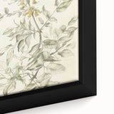 Close-up of a framed canvas artwork showcasing vibrant abstract florals in shades of pink and green, perfect for modern home decor or gallery walls.